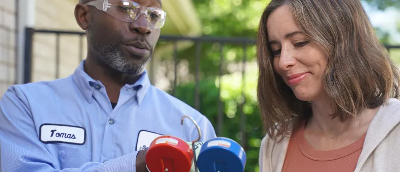 HVAC technician and woman